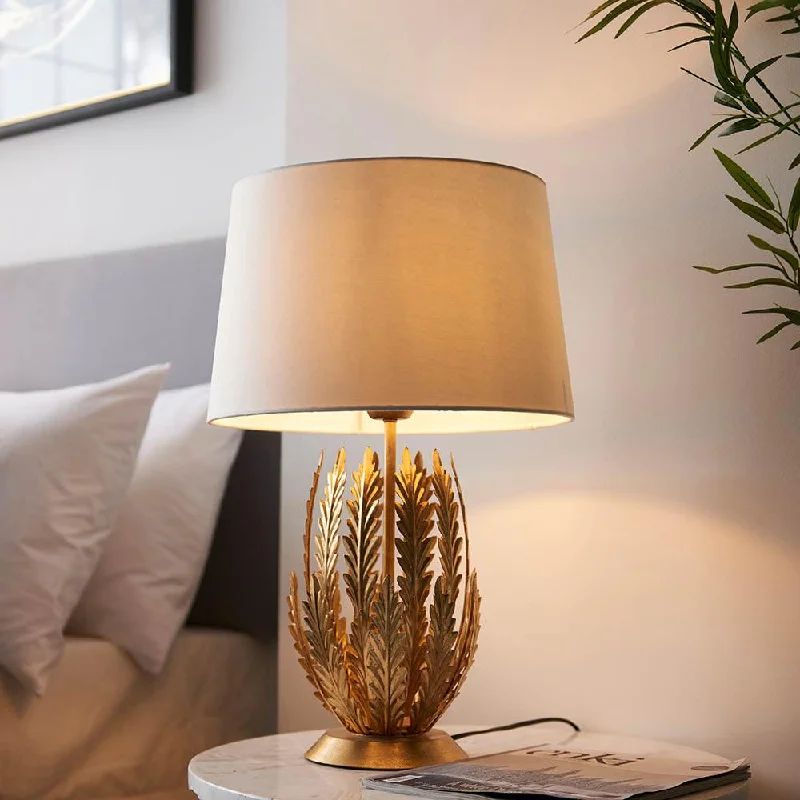 Metal Floor Lamp with a Matte Black Finish for a Sleek LookMetal Floor Lamp with a Matte Black Finish for a Sleek LookEndon Delphine 1 Light Gold Leaf Table Lamp