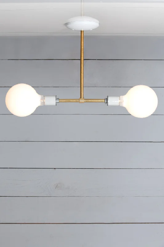 Industrial Style Ceiling Lights with Exposed Bulbs and Metal CagesIndustrial Style Ceiling Lights with Exposed Bulbs and Metal CagesBrass Pendant Light - Double Bare Bulb Lamp