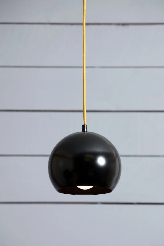 Scandinavian Style Ceiling Lights with Light Wood AccentsScandinavian Style Ceiling Lights with Light Wood AccentsEye Ball Pendant Light - Black Mid Century Lamp